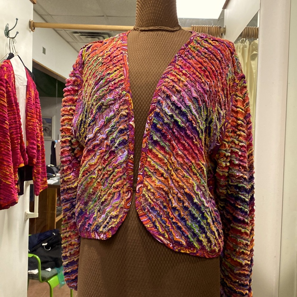 Unique multicolored chenille jacket will brighten any outfit!